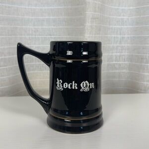 Black Ceramic Coffee Stein with Glossy Finish and Textured Design